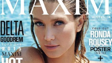 Delta Goodrem poses topless as she is named the hottest。